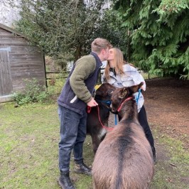 a man holding an animal