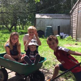 a small child sitting in a park