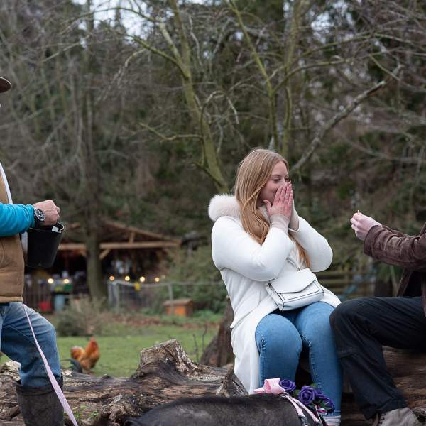 a man and a woman sitting on a bench