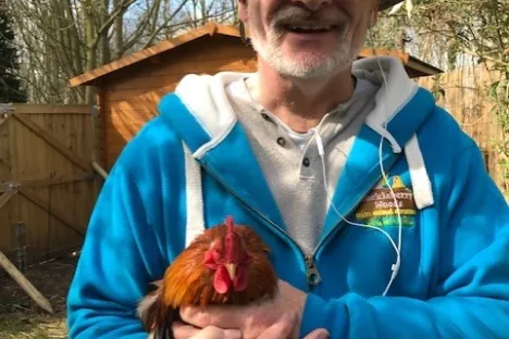 a man wearing a blue hat