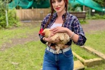 a person standing on top of a grass covered field